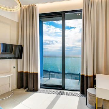 Номер "Люкс с прямым видом на море 208"