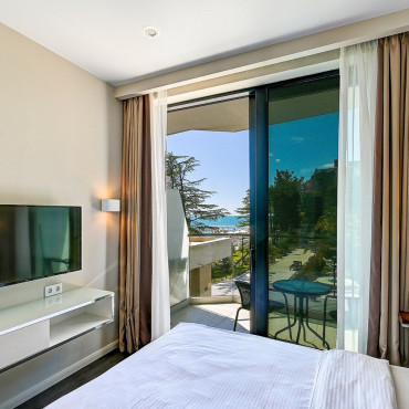 Номер "Студия с видом на море и парк 212"