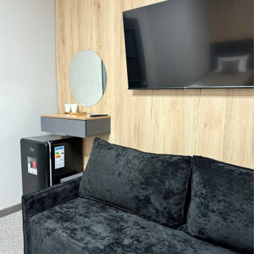 Номер "Четырехместный стандарт с 2-мя раздельными кроватями и двухместным диваном"