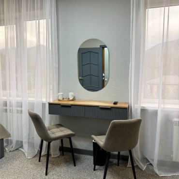 Номер "Четырехместный стандарт улучшенный с двуспальной кроватью и двухместным диваном"