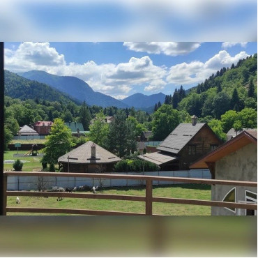 Номер "Четырехместный стандарт улучшенный с двуспальной кроватью и двухместным диваном"