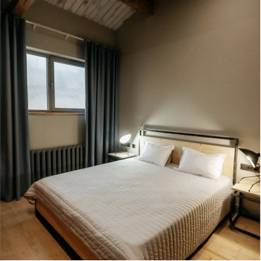 Номер "Улучшенный семейный с одной большой кроватью"