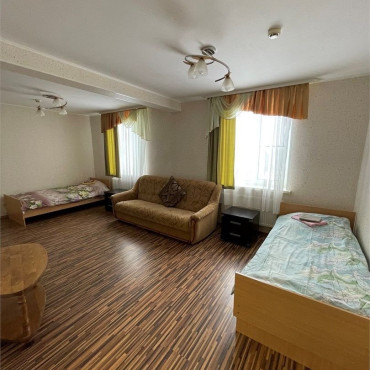 Номер "Двухместный С двумя Отдельными Кроватями доп Местом"