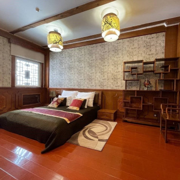 Номер "Джуниор Сюит с одной большой кроватью"