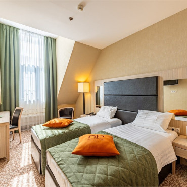 Номер "Стандарт Плюс мансардный с раздельными кроватями"