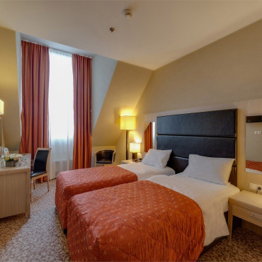 Номер "Стандарт мансардный с раздельными кроватями"