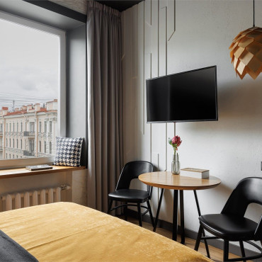 Номер "Улучшенный номер-студио с видом на Невский проспект DBL+SINGLE, от 20 кв.м"