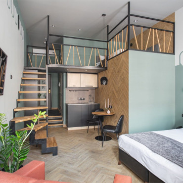 Номер "Двухуровневый номер-студио Делюкс с видом на город, от 25 кв.м"