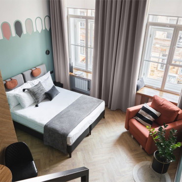 Номер "Двухуровневый номер-студио Делюкс с видом на город, от 25 кв.м"