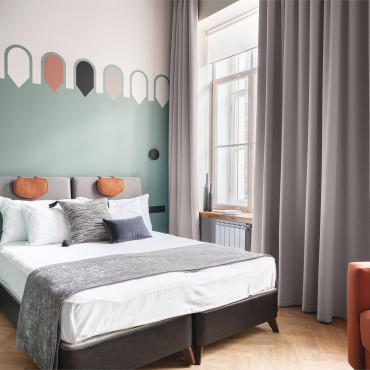 Номер "Двухуровневый номер-студио Делюкс с видом на город, от 25 кв.м"