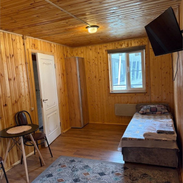 Номер "Одноместный номер Стандарт с общей ванной комнатой"