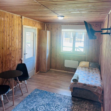 Номер "Одноместный номер Стандарт с общей ванной комнатой"