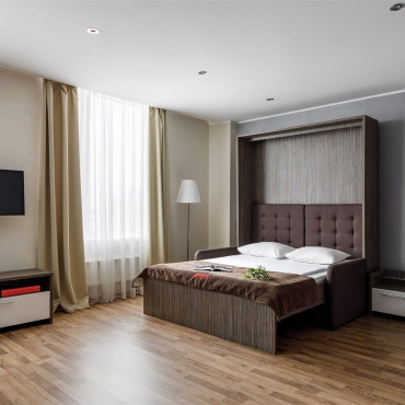 Номер "Семейный Люкс 2-х комнатный (2 двуспальные кровати-трансформеры)"