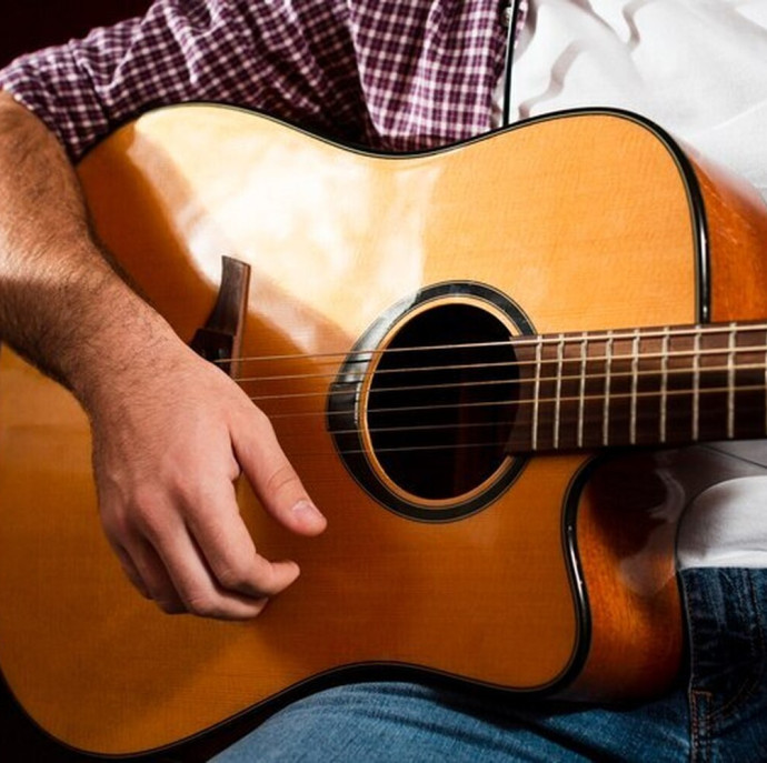 Занятия по игре на гитаре для взрослых в Москве