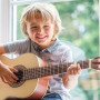 Занятия по игре на гитаре для детей в Москве
