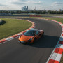 Заезд на спорткаре McLaren 570S на гоночном треке в Москве