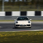 Заезд на спорткаре Porsche 911 992 4S на гоночном треке в Москве