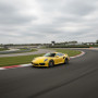 Заезд на спорткаре Porsche 911 Turbo S 991.2 на гоночном треке в Москве
