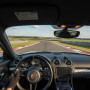 Заезд на спорткаре Porsche Cayman GT4 на гоночном треке в Москве