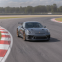 Заезд на спорткаре Porsche 911 GT3 на гоночном треке в Москве